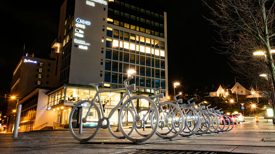 A row of artistic bike racks installed on a Norway street.