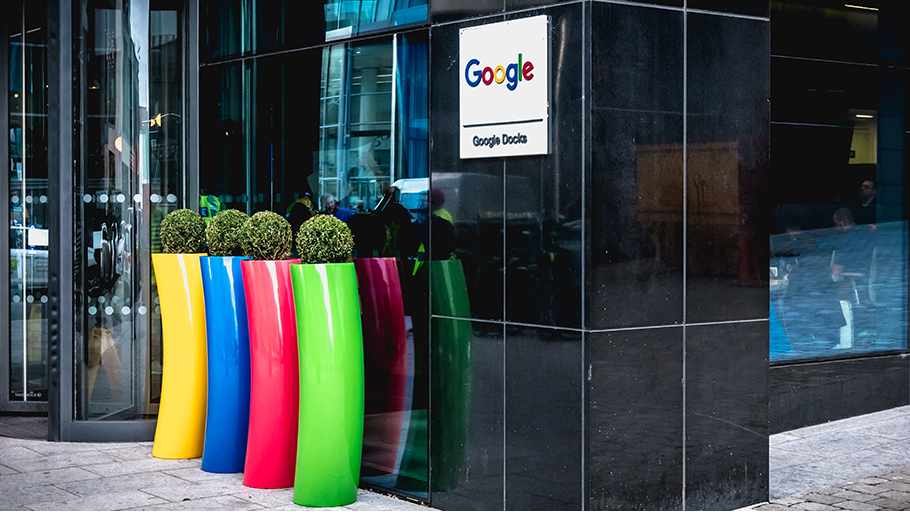 A Google facility with planter bollards that have been finished in Google’s brand colors