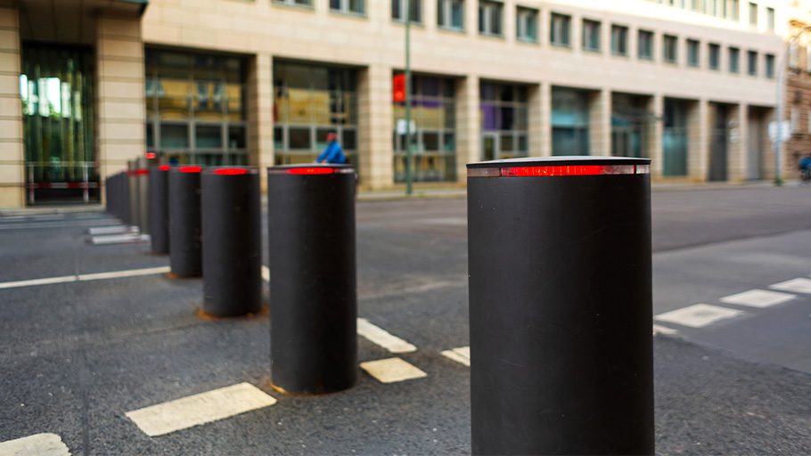 Automatic bollards creating a barrier in a roadway