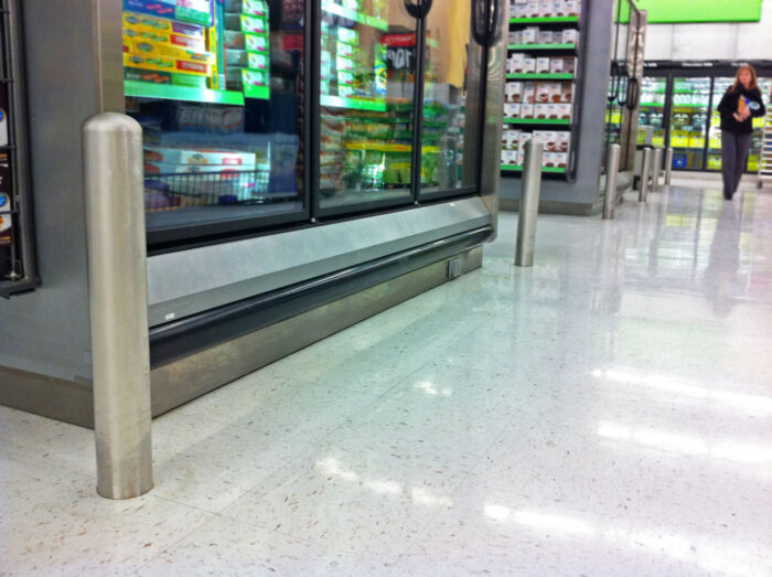 R-7186 bolt down bollards protect fridge at grocery store