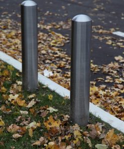 R-7301 stainless steel bollard covers on ground covered with leaves