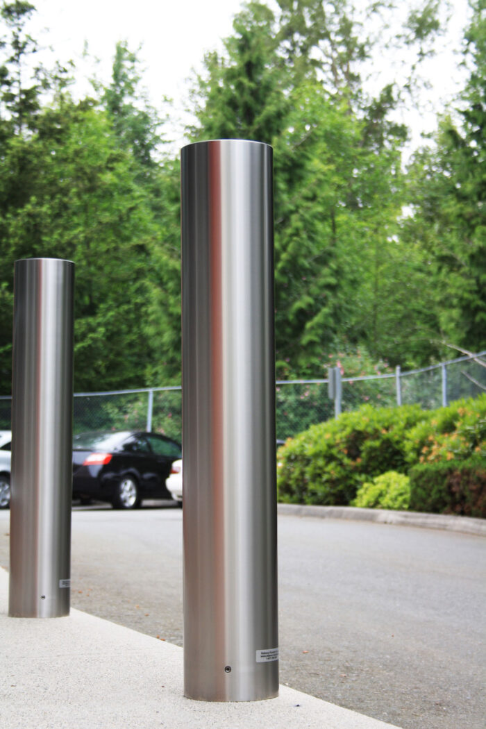 R-7303 stainless steel bollard covers in parking lot