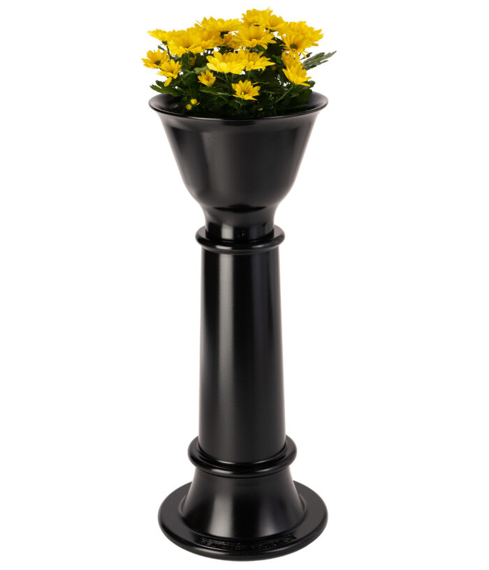 A studio shot of the R-7567 planter bollard with planted flowers