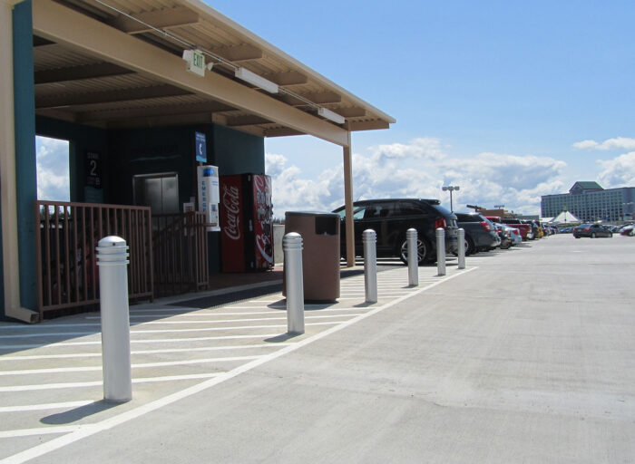 Silver R-7576 decorative bollards in outdoor parking lot
