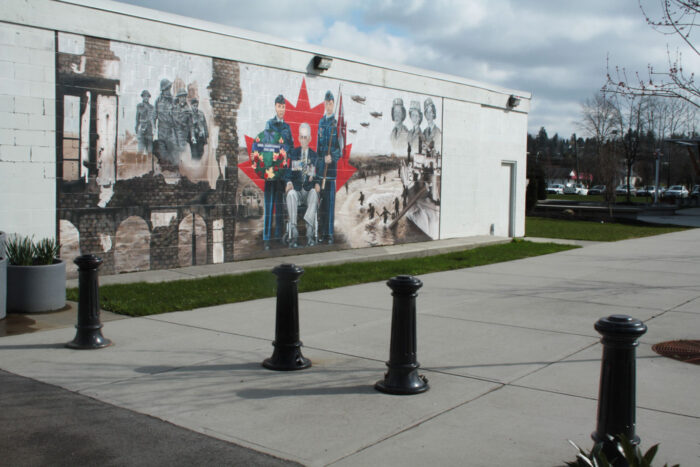 R-7581 decorative bollards in front of mural