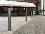 R-8464 stainless steel removable bollards in front of bank