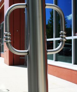 R-8903 stainless steel bollard in front of building