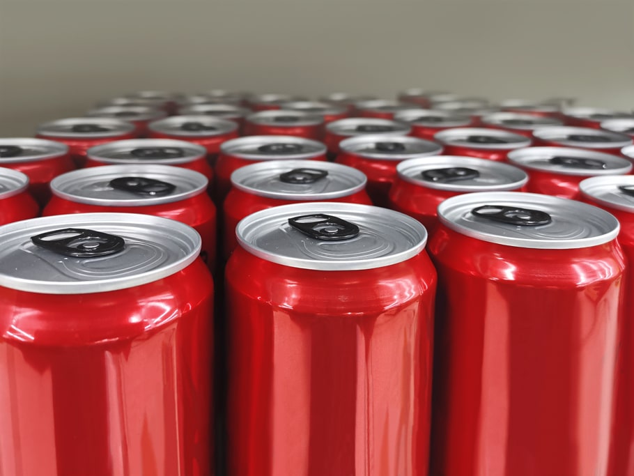 Several aluminum soda cans lined up