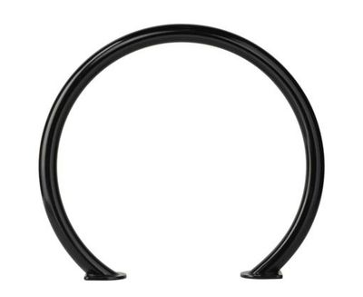 A black powder coated bike rack in the shape of a ring