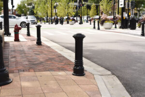 Classically shaped bollards line an attractive town square