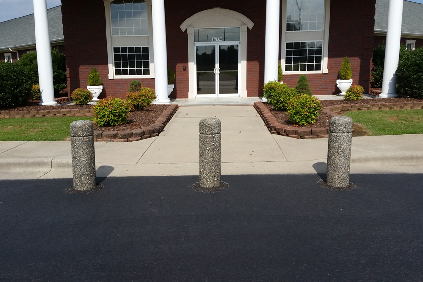 Precast concrete bollards provide security for building entrance