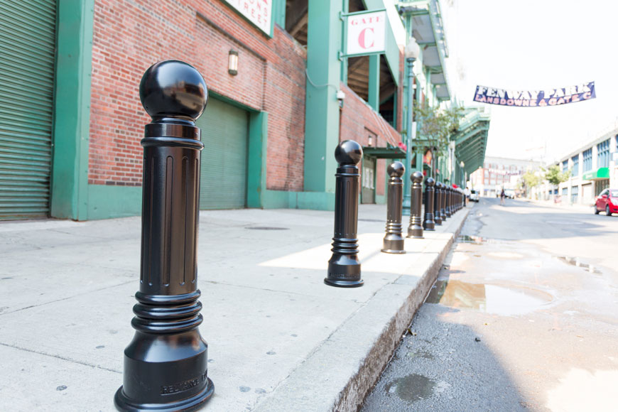 Model R-7539 bollards are shown, up-close, along a stretch of sidewalk outside Fenway Park.