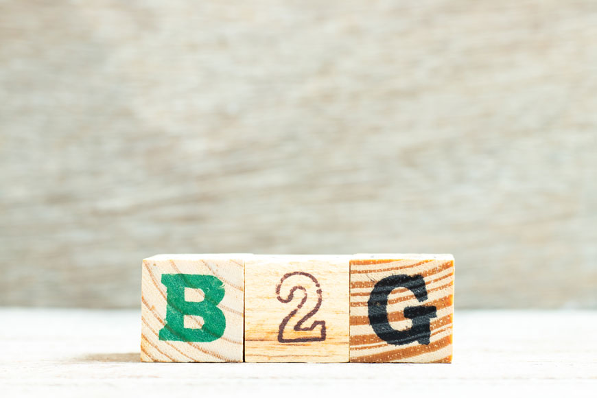 Wood blocks saying B, 2, and G meaning business to government