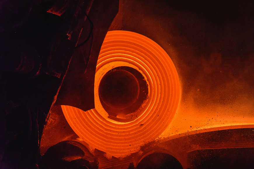 Hot rolling mild steel at processing plant