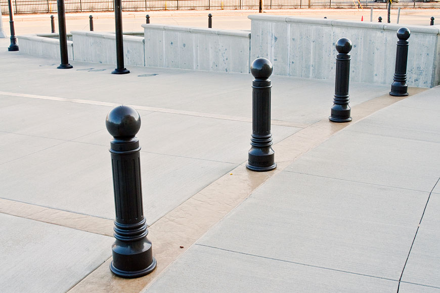 Traditional cast iron bollards give a historical flair to a security perimeter