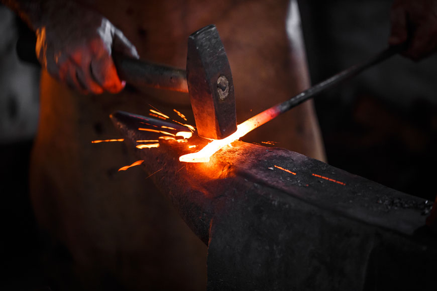 Forging hammer shapes metal