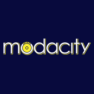 A blue background highlights the word Modacity with an abstract yellow bike wheel in the O