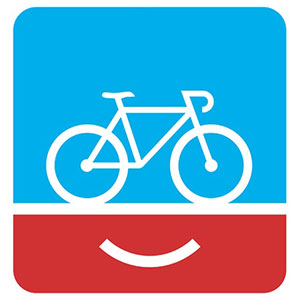A red, white, and blue logo has the wireframe of a bike looking like eyes above a smiling mouth