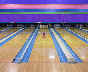 Bowling alley with polyurethane coated floor