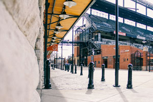 Reliance Foundry’s model R-7539 bollards are shown on Eutaw Street with Oriole Park’s bleacher seats shown in the background.