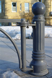 Reliance Foundry bollard custom-mounted with swing gate at Central Memorial Park