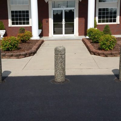 concrete bollards in front of church