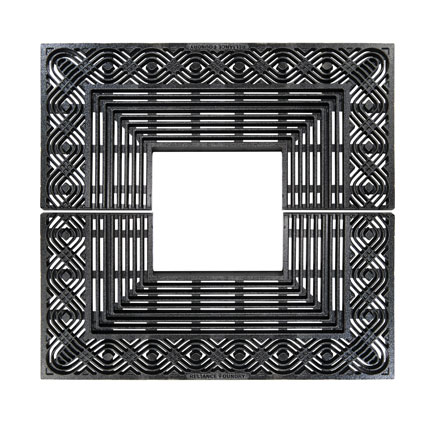 A square tree grate has a woven border and slats toward the middle.