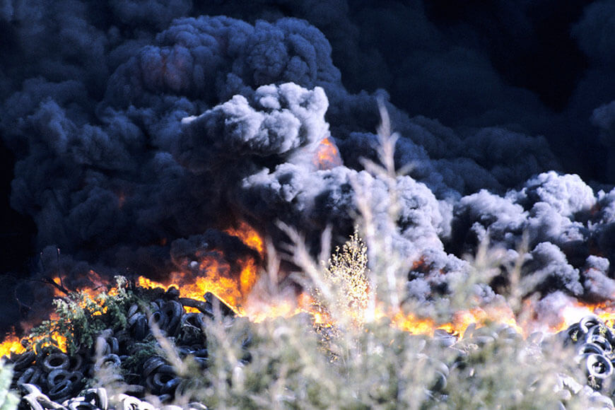 A fire caused by an ignited stockpile of tires