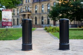17-in diameter security bollards with decorative black bollard covers protect a government building