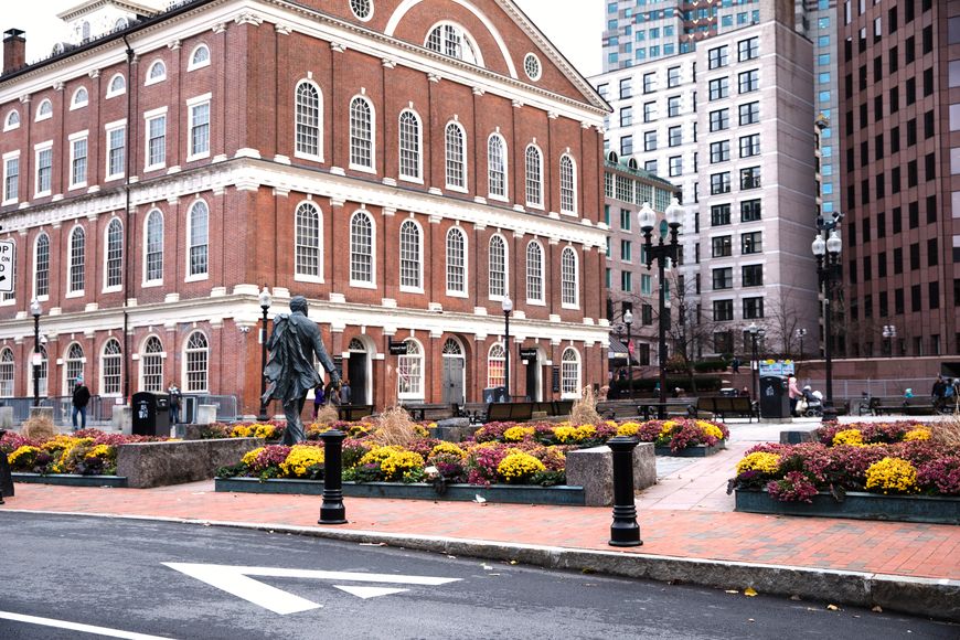 In Boston, outside Faneuil Hall, historical bollards match the architectural aesthetic