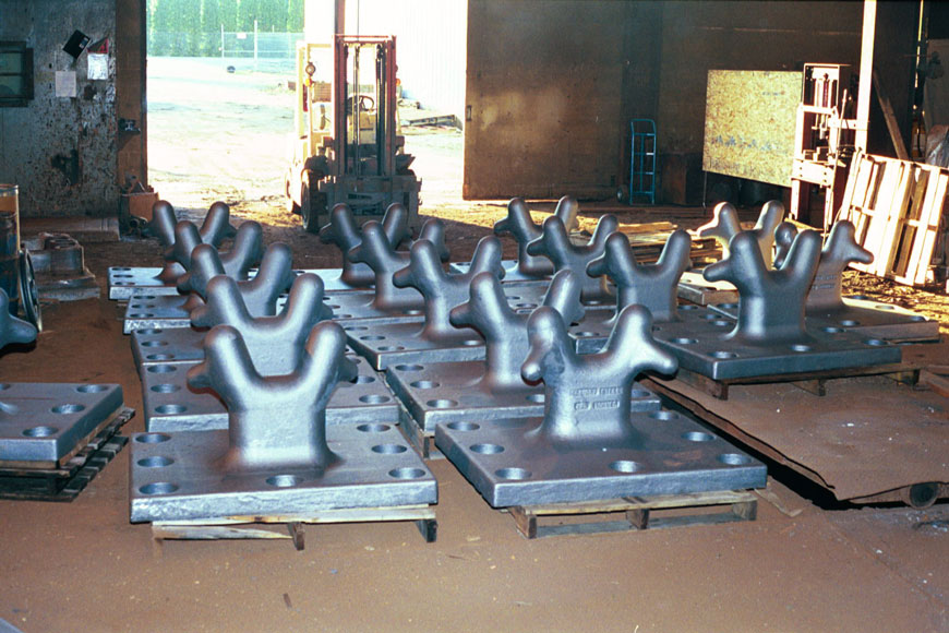 Staghorn castings sit on the foundry floor, ready for shipping