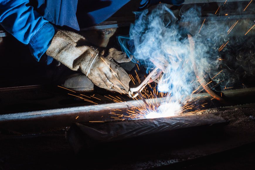 A welder uses a welding technique called stick welding